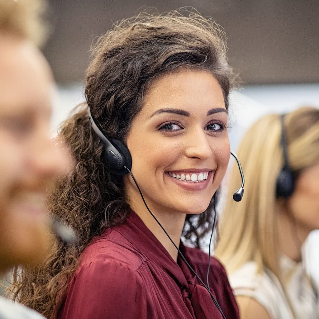 Smiling woman working in call center